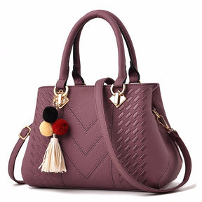 Alt-text: Bolsa La Vellure lilás em Couro Legítimo, compacta e versátil para o dia a dia

